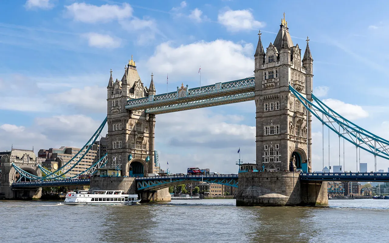 A photo of Tower Bridge with blue skies in the background