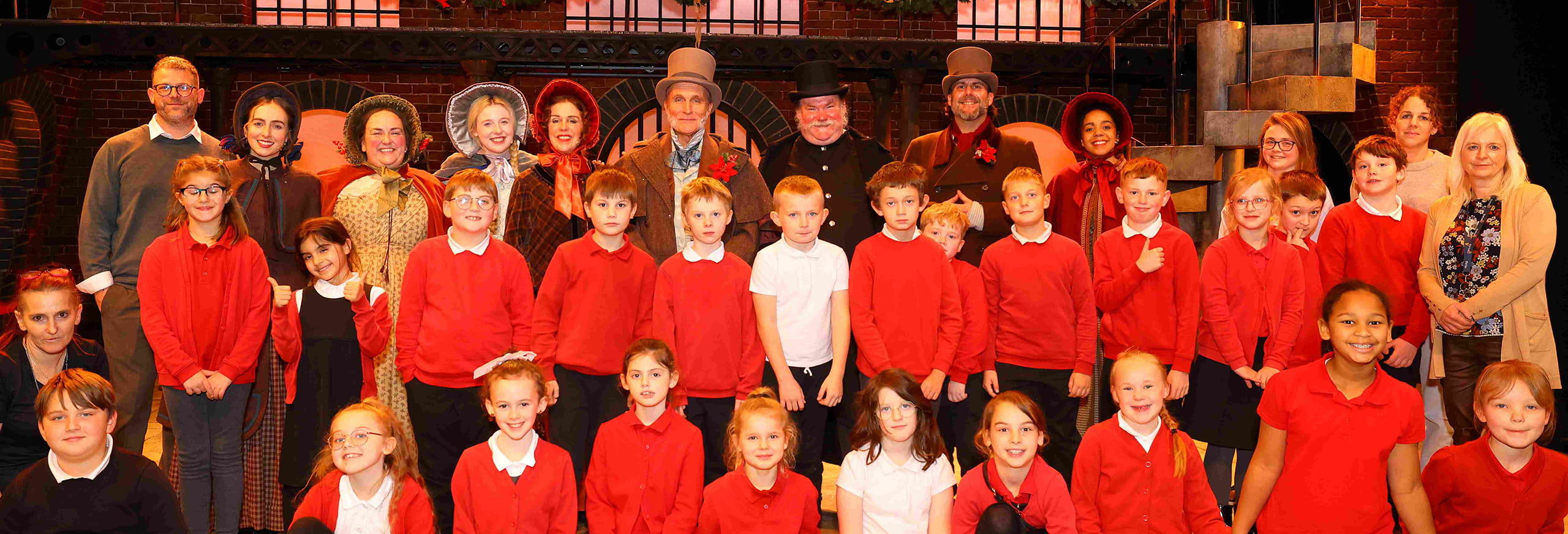A group of school children visiting Hull Truck Theatre to see Oliver Twist