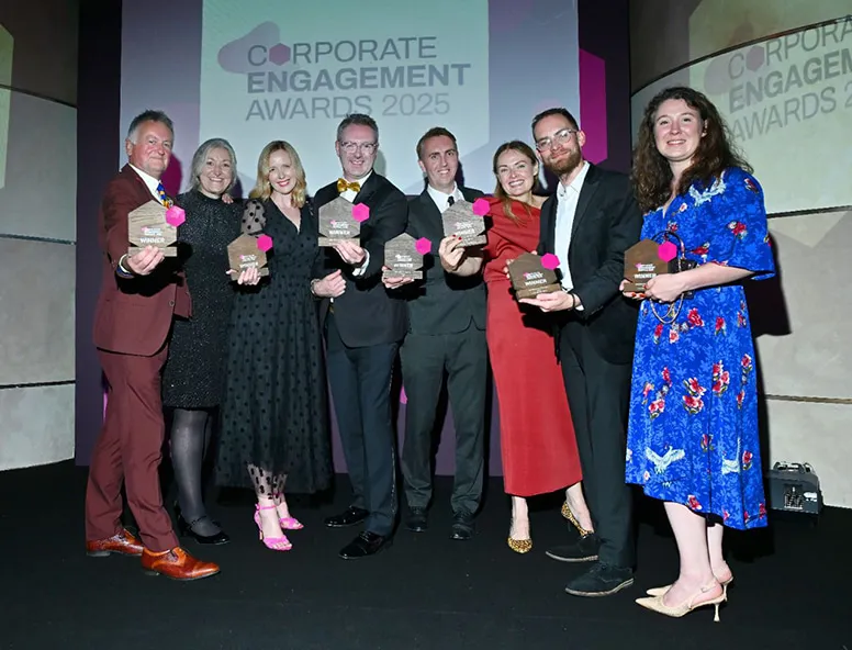 People posing for a winners photo at the Corporate Engagement Awards
