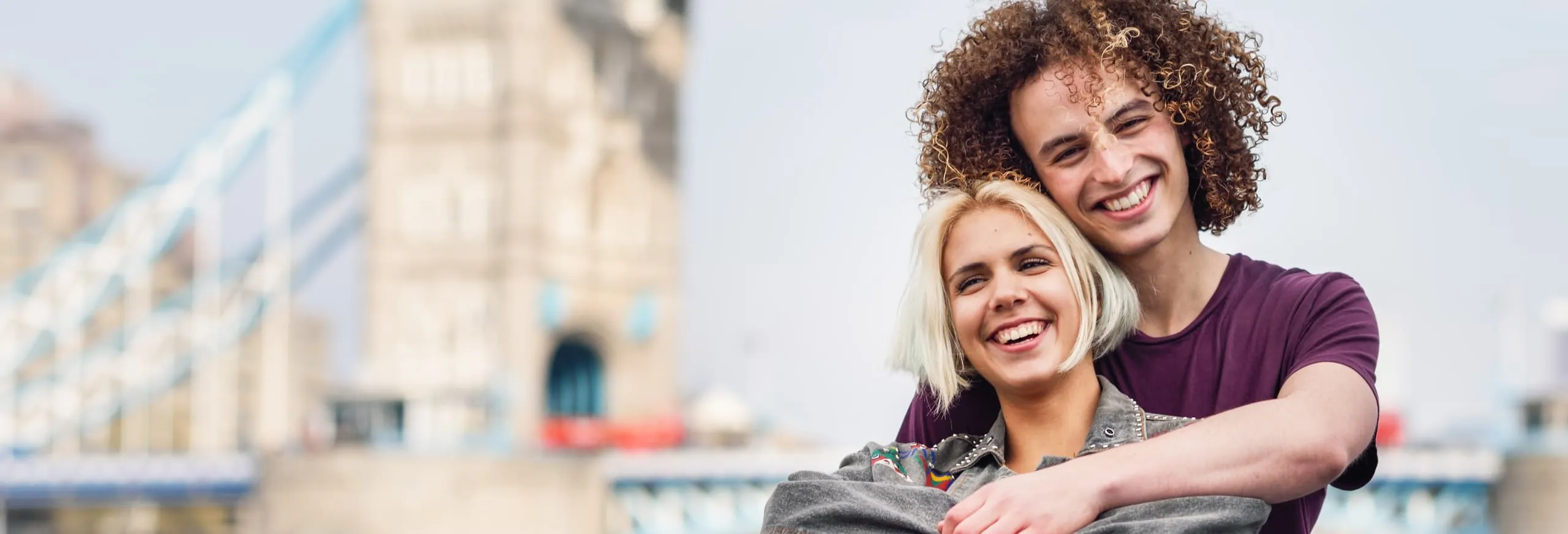 Young couple in London near Tower Bridge